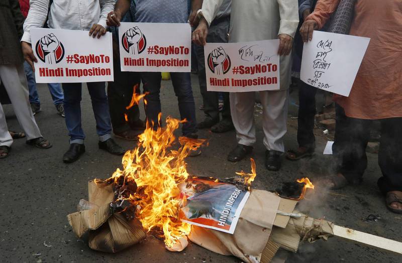 Protestors burn an effigy depicting India's Home Minister Amit Shah, during a protest against his proposal of 'One Nation, One Language' to promote Hindi, according to local media, in Kolkata, India September 16, 2019. REUTERS/Rupak De Chowdhuri