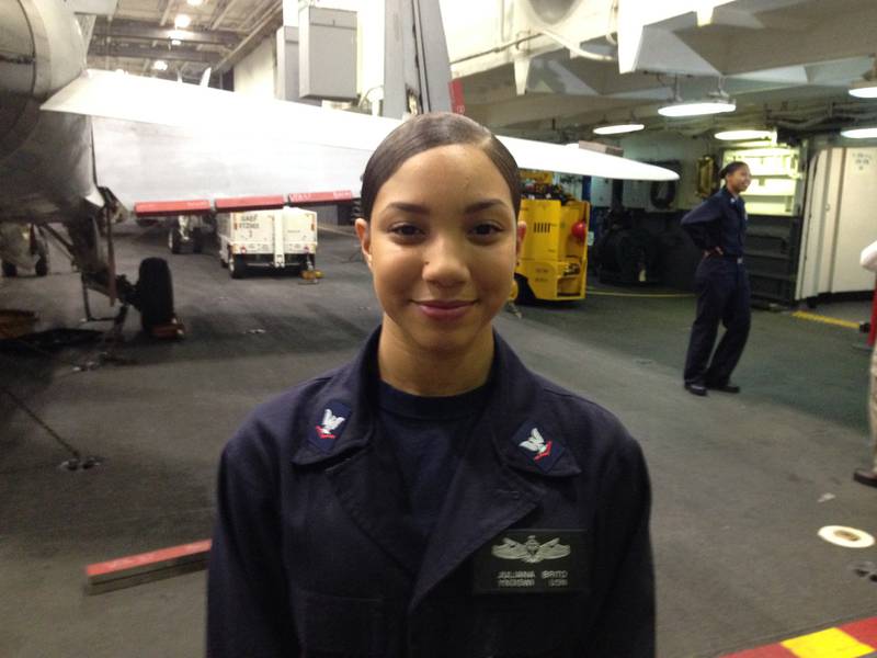 US navy Yeoman Third Class Juliana Brito, 21, an administrator on board the USS George HW Bush in the ship’s hangar.