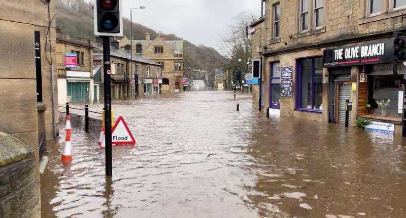 A flooded street is seen after Storm Ciara downpour in Hebden Bridge, West Yorkshire, Britain. REUTERS