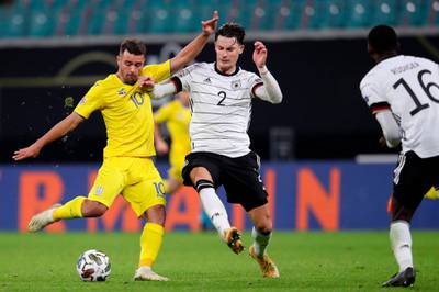 Germany defender Robin Koch and Ukraine midfielder Junior Moraes vie for the ball. AFP