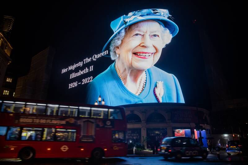 The advertising screens in Piccadilly Circus in London mark the death of the queen. Getty
