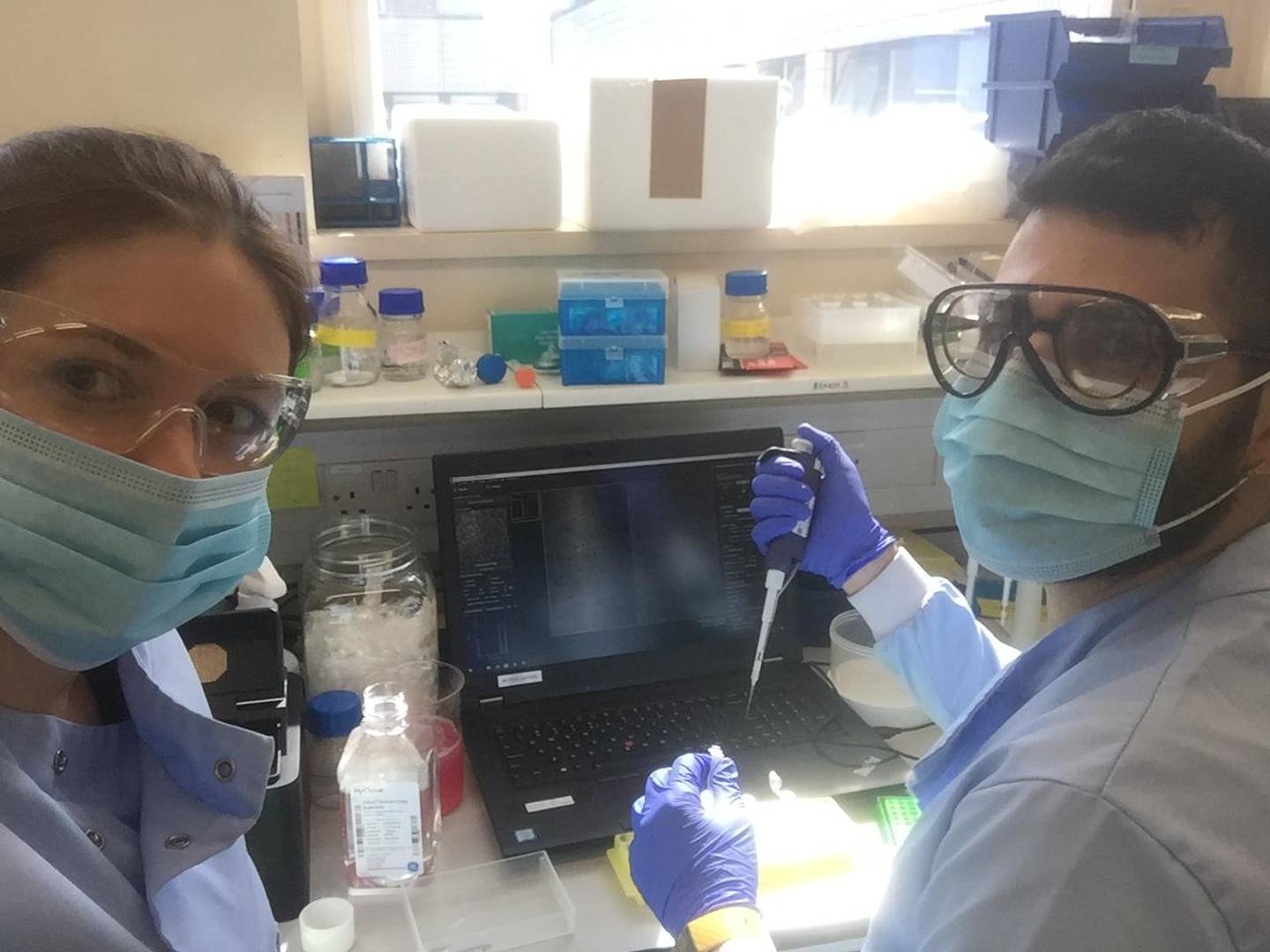 Oxford scientists analysing Covid-19 samples at the John Radcliffe Hospital, UK. Oxford University