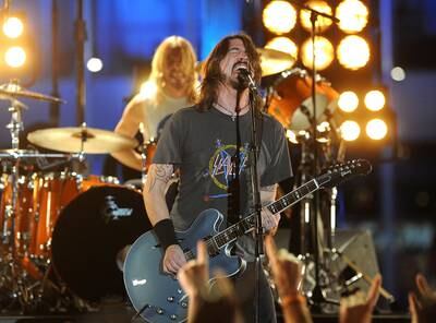 Dave Grohl and Foo Fighters were scheduled to play at the Abu Dhabi F1 Grand Prix before they were forced to cancel. Here Grohl performs onstage at the 54th Annual Grammy Awards in Los Angeles in February 2012. AFP