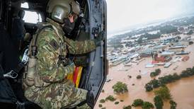Thousands of Australians put on flood alert as rain lashes Sydney