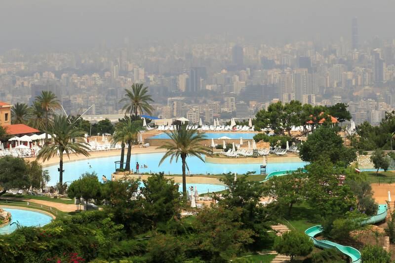 Waves Aqua Park and Resorts is pictured in Mansourieh overlooking Beirut city, which is shrouded in a haze of pollution, Lebanon June 25, 2016. REUTERS/Jamal Saidi