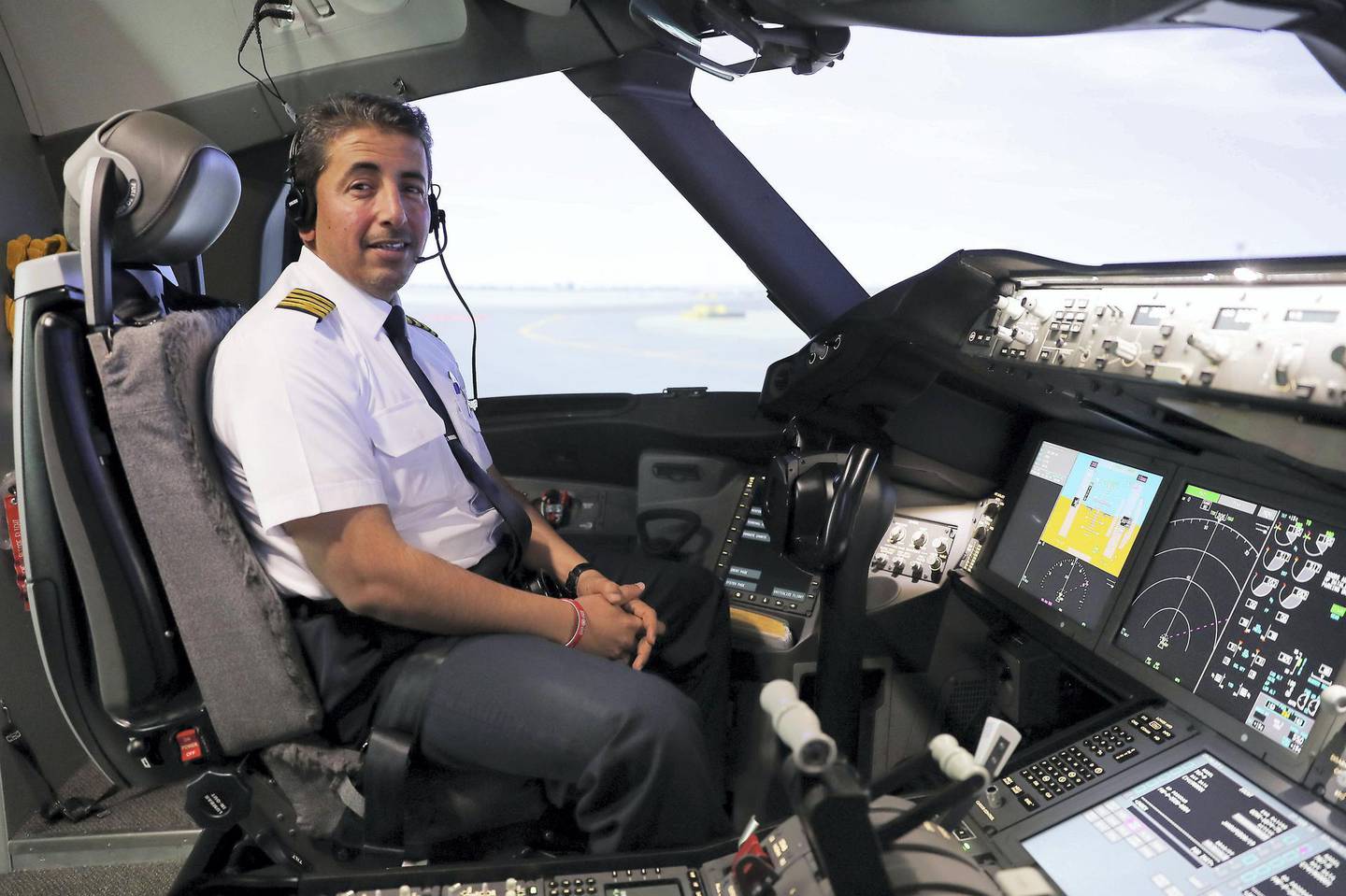 ABU DHABI , UNITED ARAB EMIRATES , February 27 – 2019 :- Captain Abdulla Obaid, Emirati pilot who flew the Pope home at the Etihad Boeing 787 flight simulator at Etihad HQ near the airport in Abu Dhabi. ( Pawan Singh / The National ) For POAN. Story by Gillian