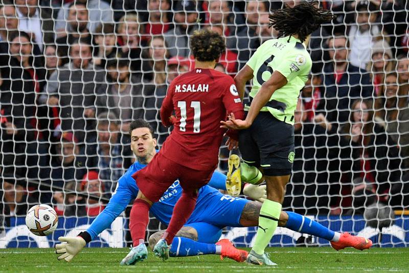 Manchester City goalkeeper Ederson saves from Liverpool's Mohamed Salah. AFP
