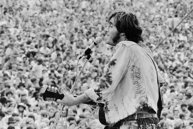 John Sebastian performs at the Woodstock Music Festival. Baron Wolman / The Museum at Bethel Woods via Reuters
