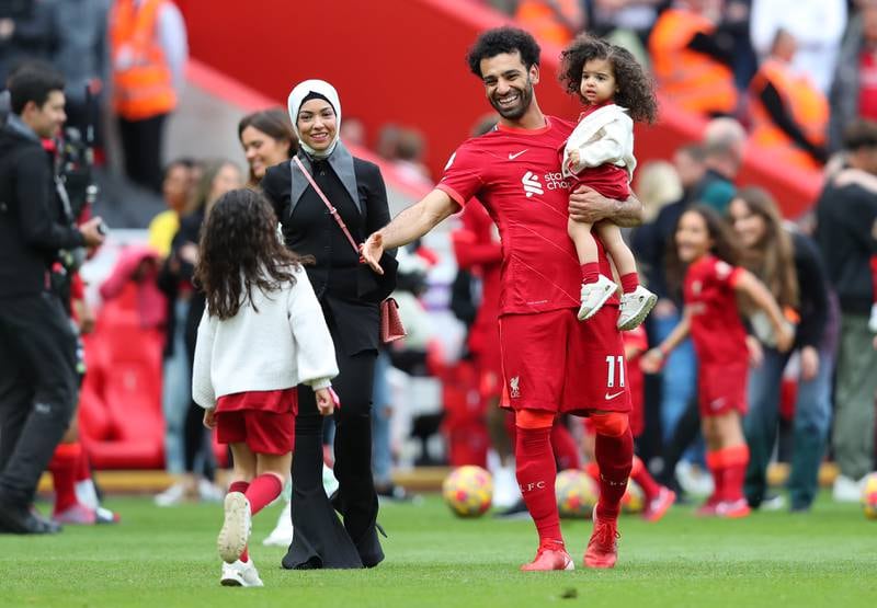 Mohamed Salah on the pitch with his family following the last match of the Premier League season, a 3-1 win against Wolves. Getty