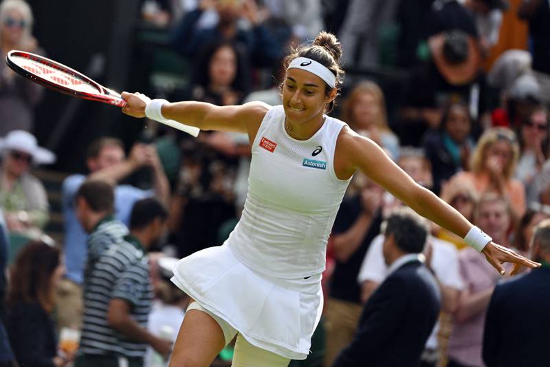 Caroline Garcia celebrates after beating Emma Raducanu 6-3, 6-3 in their second-round match at Wimbledon on Wednesday, June 29, 2022. AFP