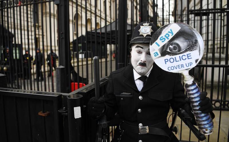A lone protester demonstrates at Downing Street in London. EPA