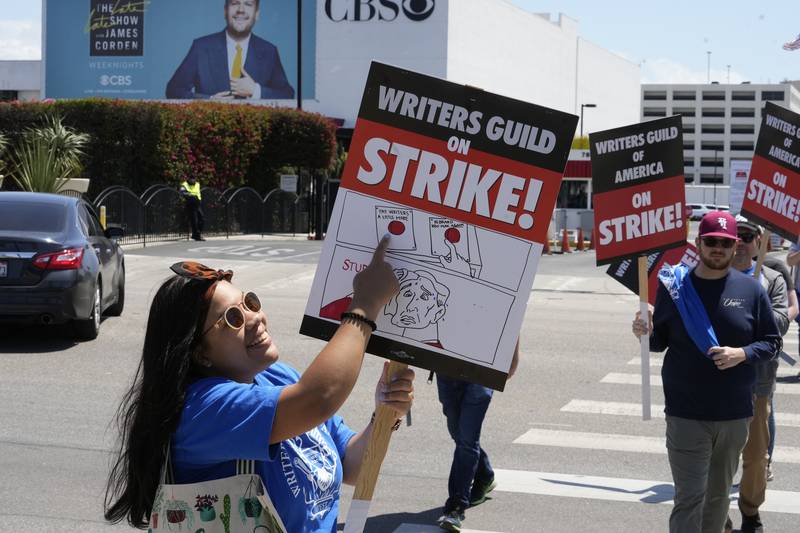 Zoe Marshall, a board member of the Writers Guild of America, left, outside the CBS Television City. AP Photo 