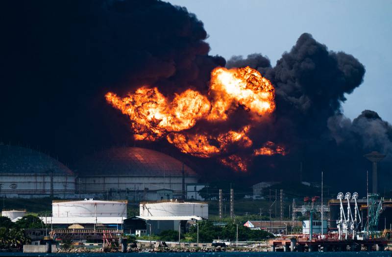 Cuba has asked for help to contain the enormous fire that left more than 120 people injured and 17 firefighters missing. About 800 people have been evacuated from the area. AFP