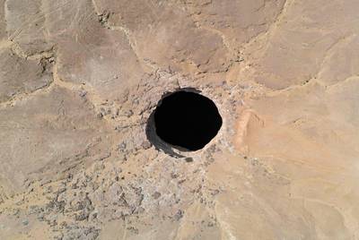 The 'well' is thought to be anywhere between 100 and 250 metres deep. AFP