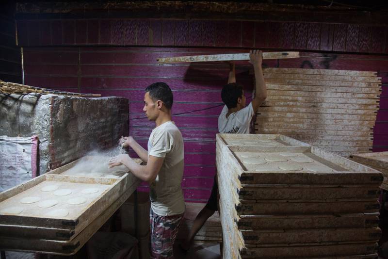 Bakers at work in Cairo. Grain prices have soared in Egypt due to the war in Ukraine. Bloomberg.