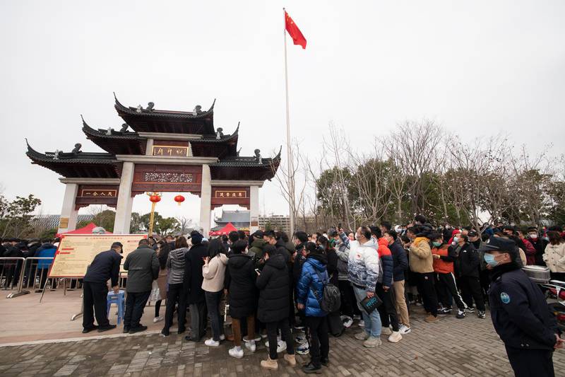 People wait in line to enter a temple for prayers in Shanghai, China. Today marks the fifth day of Spring Festival celebrations in China. Getty Images