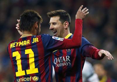 Lionel Messi celebrates with Neymar after scoring the 3-3 equaliser on Sunday. Juanjo Martin / EPA / March 23, 2014