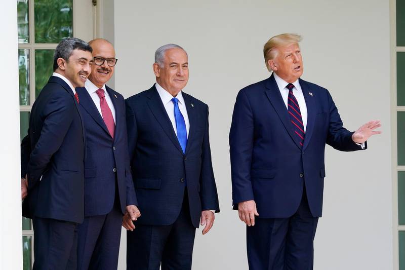 President Donald Trump walks to the Abraham Accord signing ceremony at the White House with Sheikh Abdullah bin Zayed, UAE Minister of Foreign Affairs and International Co-operation, Israeli Prime Minister Benjamin Netanyahu, and Bahrain's Foreign Minister Abdullatif Al Zayani. AP