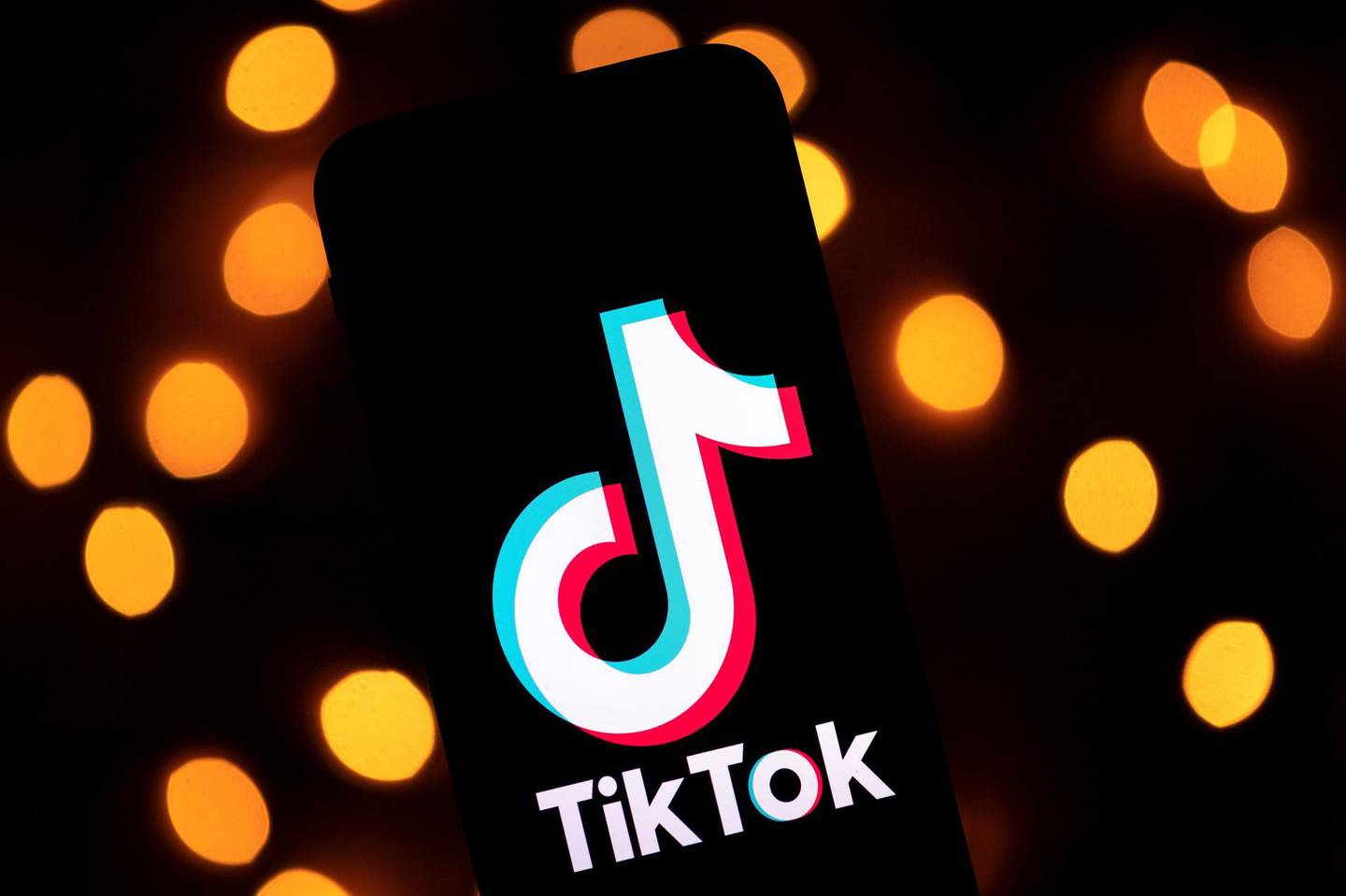 (FILES) This file photo taken on November 21, 2019 shows the logo of the social media video sharing app Tiktok displayed on a tablet screen in Paris. Microsoft announced on August 2, 2020 it would continue talks to acquire the US operations of popular video-sharing app TikTok, after meeting with President Donald Trump who seemingly backed off his earlier threats to ban the Chinese-owned platform. / AFP / Lionel BONAVENTURE
