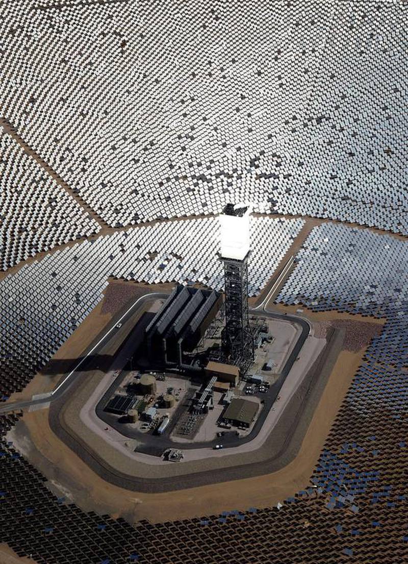 The 300,000 computer-controlled mirrors reflect sunlight to boilers that sit on 459-foot towers. The sun’s power is used to heat water in the boilers’ tubes and make steam, which in turn drives turbines to create electricity. Ethan Miller / Getty Images / AFP