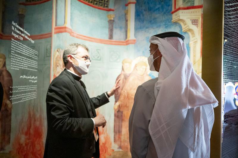 Sheikh Mohamed inside the Holy See Pavilion, which is named after the governing body of the Roman Catholic Church.