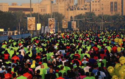 Runners take part in the 2015 Standard Chartered Dubai Marathon. Francois Nel / Getty Images