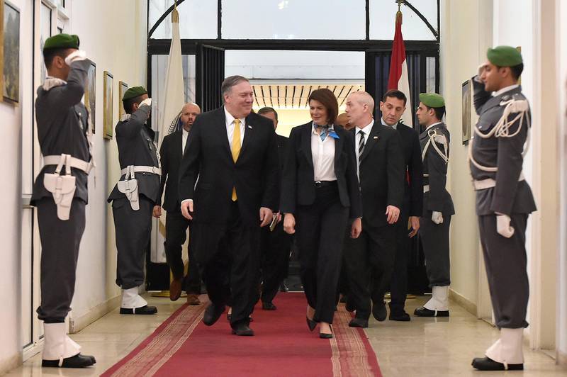 Minister of Interior Raya Hassan, centre right, welcomes Mr Pompeo at the Lebanese Ministry of Interior in Beirut. EPA