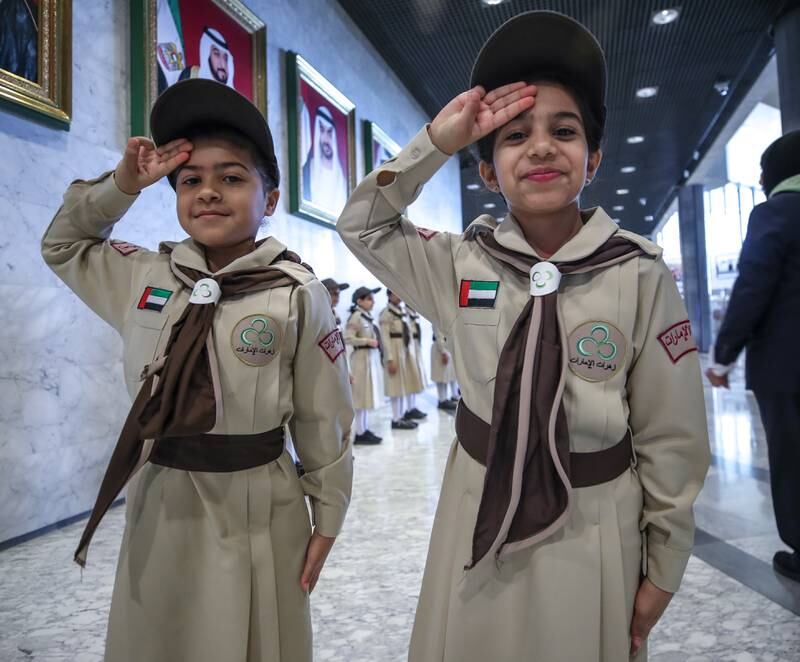 Nouf Abdul Salam, 9, and Wufa Ahmed, 9, welcome guests to the 23rd Arab Regional Conference. Victor Besa / The National