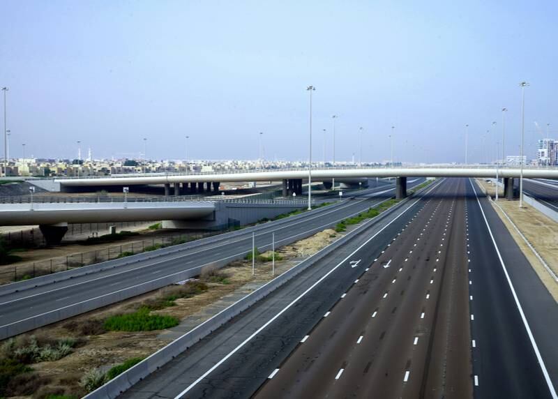 Abu Dhabi, United Arab Emirates, March 27, 2020.  The nearly empty Dubai-Abu Dhabi road on the first day of the UAE cleaning campaign.  Emiratis and residents across the UAE must stay home this weekend while a nationwide cleaning and sterilisation drive is carried out. Victor Besa / The National