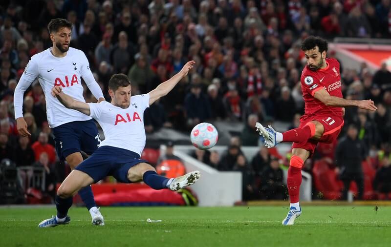Tottenham defender Ben Davies blocks a shot from Mohamed Salah. Getty