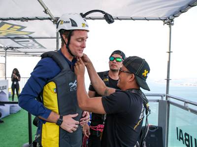 December 4, 2017.  Dubai Marina Mall.  The National reporter, Nick Webster,  gets on the XDubai Zipline, the World's Longest Urban Zipline.  Nick is helped with his zipline gear.Victor Besa for The NationalNationalReporter:  Nick Webster