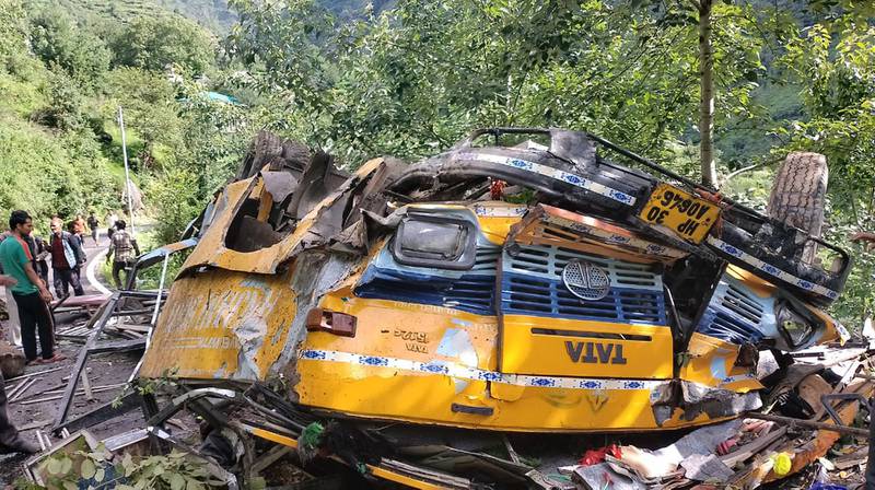 A passenger bus that bus slid off a mountain road and fell into a deep gorge near Kullu, in India's Himachal Pradesh state, on July 4. More than a dozen people including schoolchildren were killed in the accident. AP