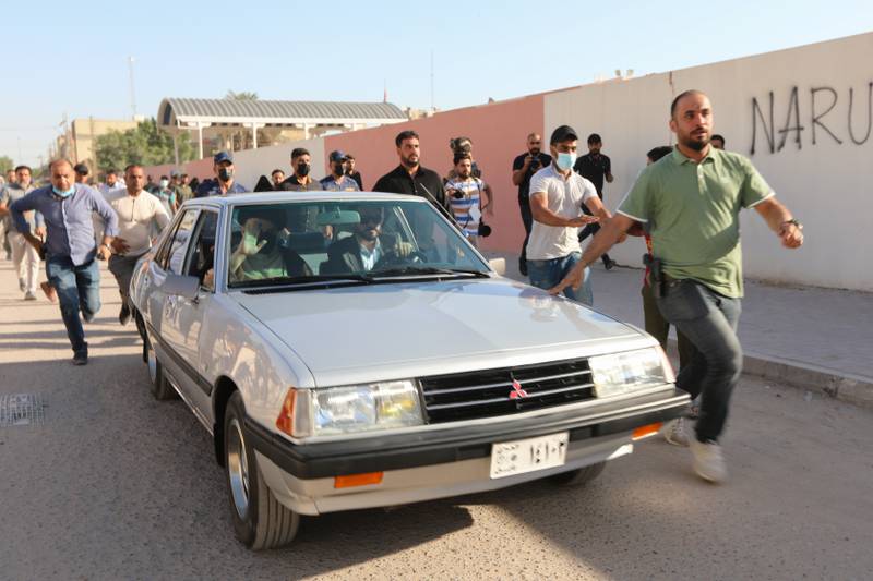 Iraqi Shiite cleric Moqtada Al Sadr waves from a car in Najaf. Photo: Reuters