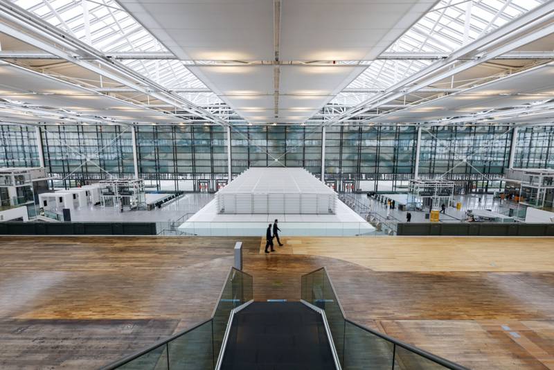 An empty departures hall at Munich International Airport. Bloomberg