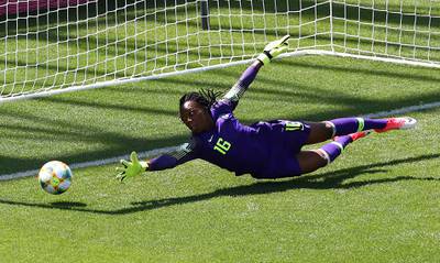 Nigeria's Chiamaka Nnadozie makes a save against South Korea. Nigeria won the Group A match 2-0. Reuters