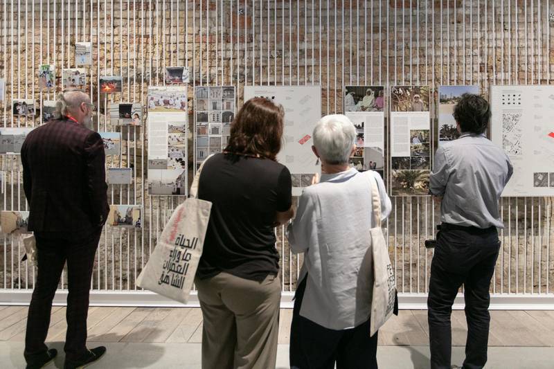 Visitors at the Lifescapes Beyond Bigness exhibition curated by Dr Khaled Alawadi for the Venice Biennale of Architecture in 2018. National Pavilion UAE