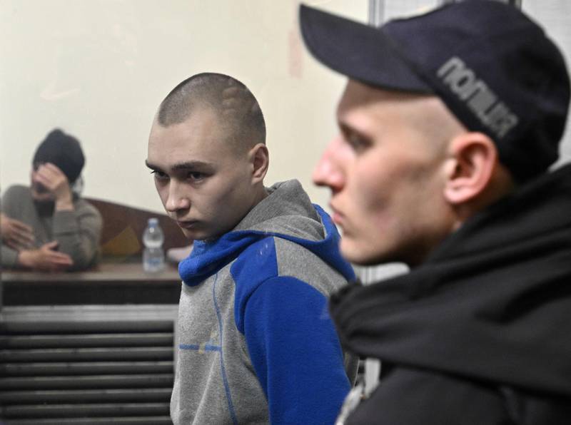 Russian soldier Vadim Shishimarin, centre, on trial for war crimes in the Solomyansky district court in Kyiv, Ukraine. AFP