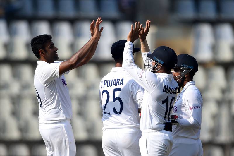 India players celebrate after beating New Zealand on Day Four of the second test in Mumbai. AFP