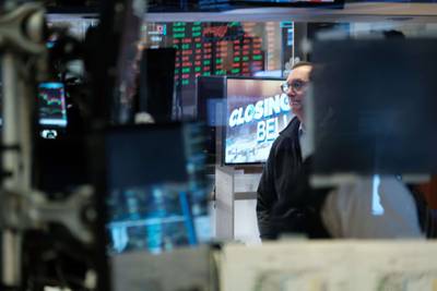 Traders work on the floor of the New York Stock Exchange. US Treasuries have sold off heavily, with 10-year bond yields rising to their highest level since June and triggering a decline in equity markets, before falling slightly at the end of last week. Getty Images / AFP