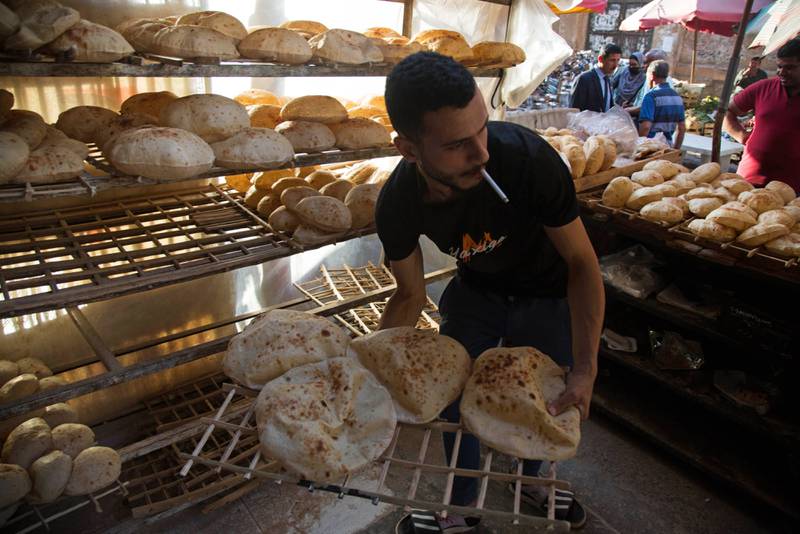 Freshly baked bread at Al-Monira market in Cairo. About 70 million Egyptians rely on heavily subsidised bread. Bloomberg