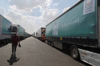 Lorries carrying humanitarian aid to Palestine line up on the desert road from Cairo, heading for the Rafah border crossing into Gaza. Reuters
