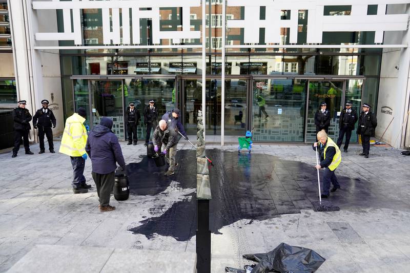 Black paint on the pavement outside the Department of Levelling Up, Housing and Communities in London following the protest. PA
