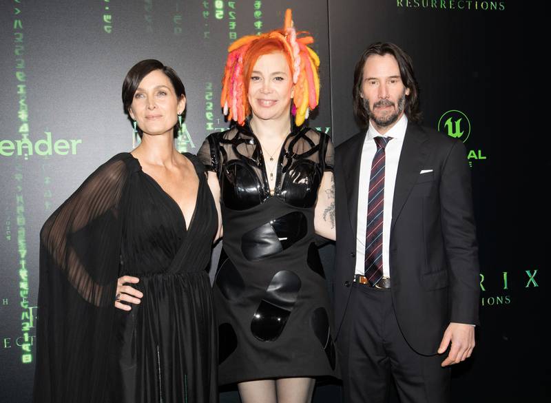 SAN FRANCISCO, CALIFORNIA - DECEMBER 18: (L-R) Carrie-Anne Moss, Lana Wachowski, and Keanu Reeves attend "The Matrix Resurrections" Red Carpet U. S.  Premiere Screening at The Castro Theatre on December 18, 2021 in San Francisco, California.    Kelly Sullivan / Getty Images / AFP
