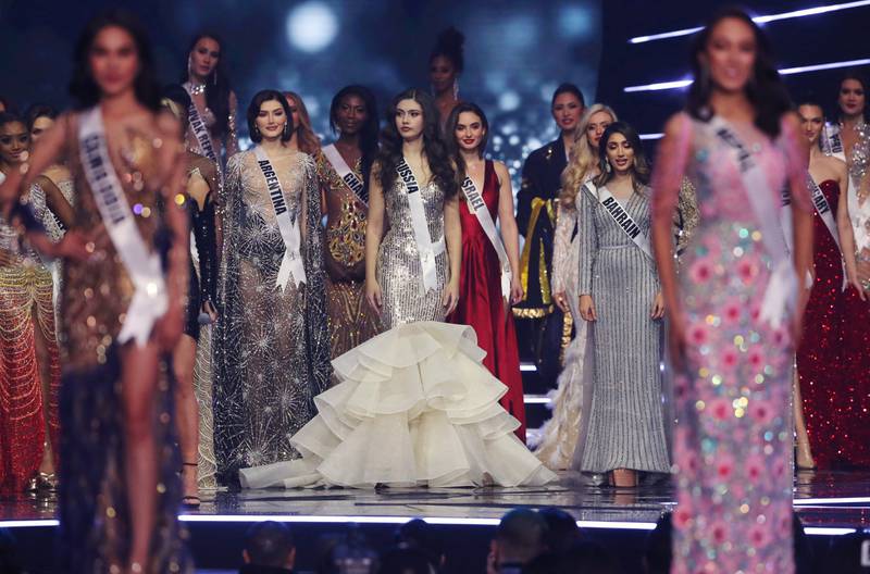 Miss Universe 2021 contestants pose during the pageant. Reuters