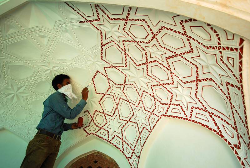 A craftsman works on the restoration of the Mughal Emperor Humayun’s 16th century garden tomb. The project was completed by the Aga Khan Trust for Culture in September of 2013. AKTC