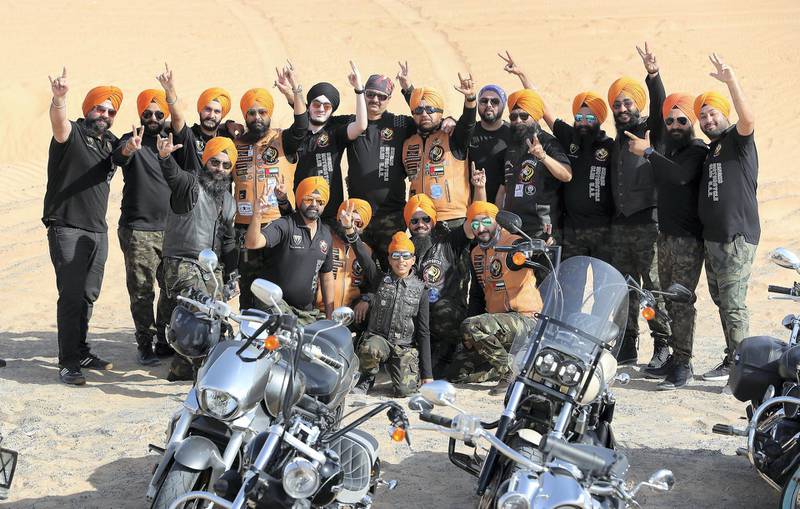 DUBAI ,  UNITED ARAB EMIRATES , May 17 – 2019 :- Members of the SMC ( Singhs Motorcycle Club UAE ) posing for the photo during the morning bike ride in Dubai. They are into charity events also. This Club was founded by Gurnam Singh ( center ) and Tanuj Singh in 2014. They ride every Friday morning in different parts of the UAE. ( Pawan Singh / The National ) For Arts&Culture/Big Picture/Instagram/Online. Story by Kate