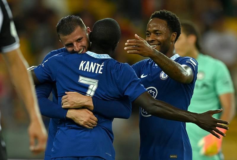 Chelsea's Ngolo Kante celebrates with teammates Mason Mount and Raheem Sterling after scoring in their pre-season friendly against Udinese at Dacia Arena on Friday, July 29, 2022. Getty