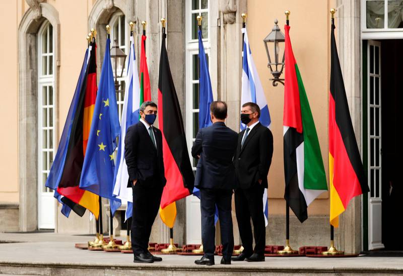 UAE Foreign Minister Sheikh Abdullah bin Zayed, his Israeli counterpart Gabi Ashkenazi and German Foreign Minister Heiko Maas before their historic meeting at Villa Borsig in Berlin, Germany.  AFP
