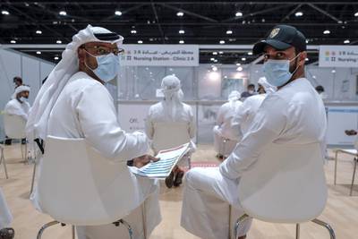 Abu Dhabi, United Arab Emirates, August 6, 2020.  Vaccine volunteers wait to get their tests at the ADNEC volunteer facility. Victor Besa /The NationalSection: NAReporter:  Shireena Al Nowais