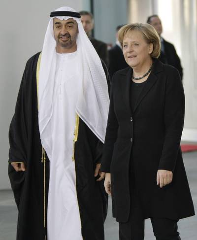 Sheikh Mohammed with the German Chancellor Angela Merkel in 2009.  Herbert Knosowski / AP Photo